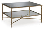 Aged gold glass cocktail table on white background