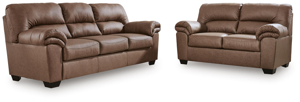 Caramel sofa and loveseat set on white background