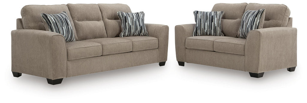 Mocha sofa and loveseat set on white background