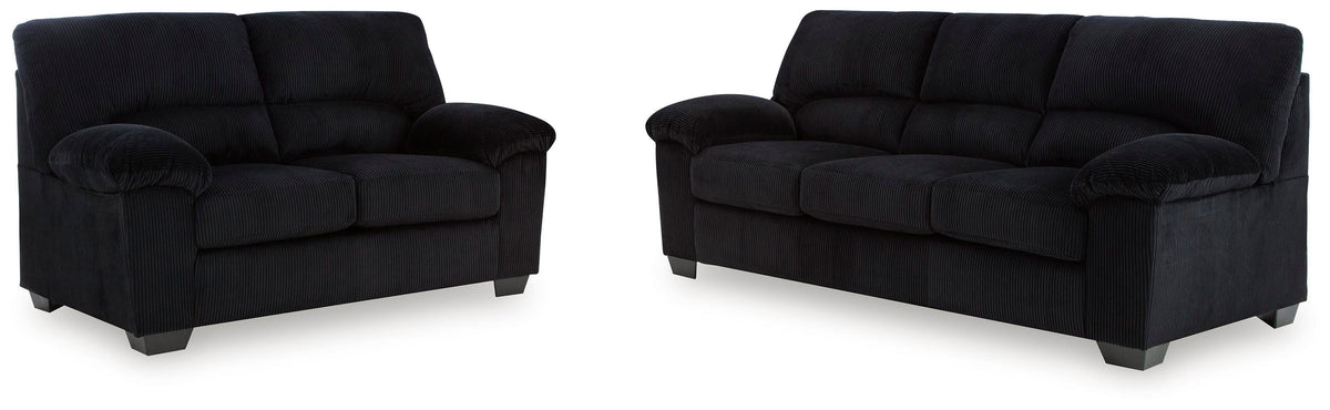 Onyx sofa and loveseat set on white background
