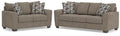 Suede-color sofa and loveseat set on white background
